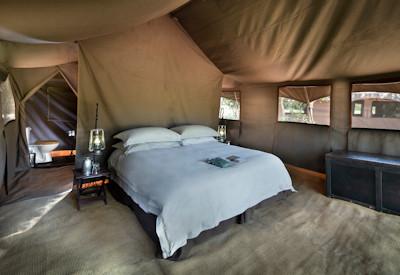 Large and luxurious en-suite tented suites