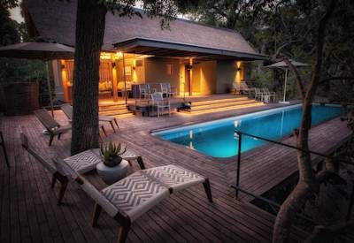 Swimming pool and sun loungers