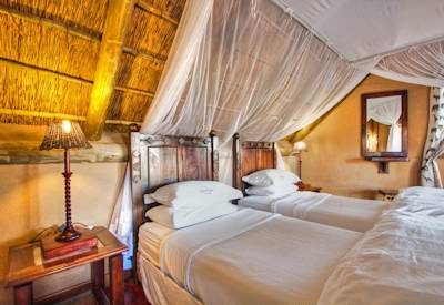 Thatched bedrooms at the lodge
