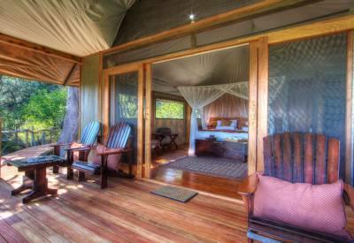 Romantic safari suites overlooking islands dotted with palms