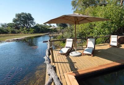 Swimming pool at water of the Okavango