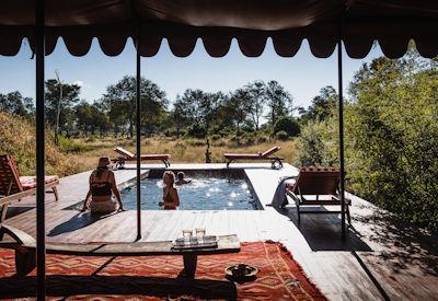 Relax at the camp pool at Mbamba