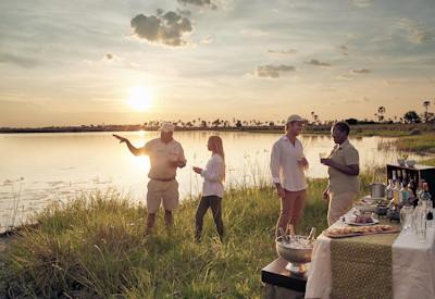 Okavango Sanctuary camp sunset drinks