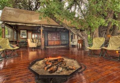 Viewing and fire pit deck nestled on a lush private island