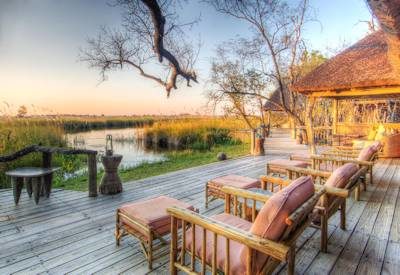 Sun loungers overlooking Xakanaxa Lagoon