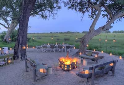 Camp outdoor dining area and fire pit