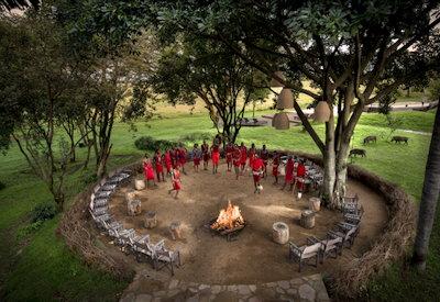 Maasai dancing around firepit