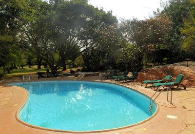 Pool at Kilaguni with sun loungers