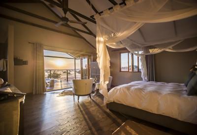 En-suite accommodation with air conditioning and mosquito netting