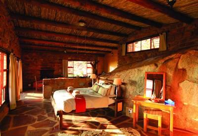 Rock and thatch chalets with double bed options
