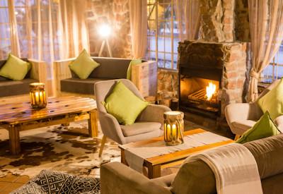 Lounge area with fireplace at night