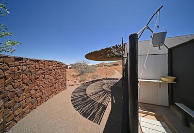 En-suite bathroom with open air showers