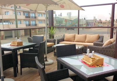 Outdoor dining area with views of Swakopmund