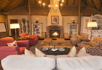 Thatched lounge with fireplace