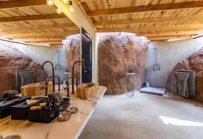 Granite boulders in the partial open air bathrooms