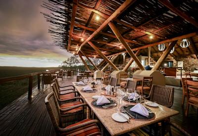 Lounge and dining areas with views out over the Ongava Reserve