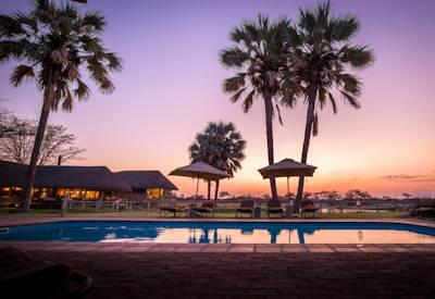 Swimming pool with Etosha sunset