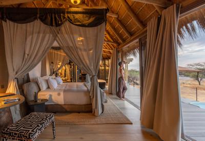 Luxury accommodation with thatched roof and private deck
