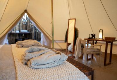 Tented accommodation with extra length beds