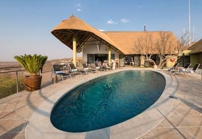 Main swimming pool and outdoor dining area