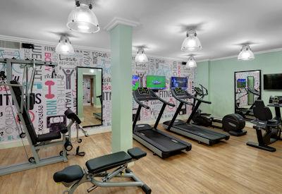 Well equipped gym area with crystal steam rooms