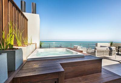 Romantic hot tub and luxury bathroom amenities
