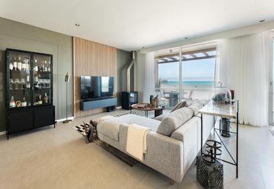 Beach pods with living room space and private bar