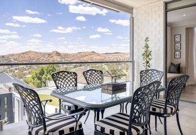 The weinberg boutique hotel and view of surrounding valley