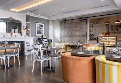 Book a dining table at two upmarket restaurants inhouse
