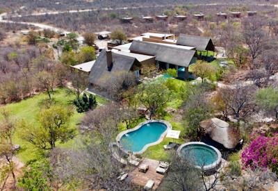 The main guest area with thatched roof and pools