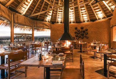 Main open air dining room with fire place