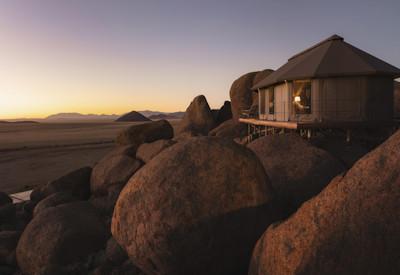 Bedroom tents are perfect located on granite boulders in authentic desert