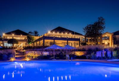 Swiming pool with sun loungers