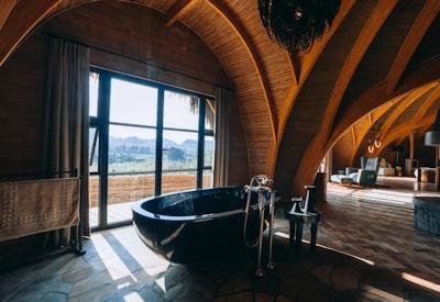 En-suite bathroom with hot tub