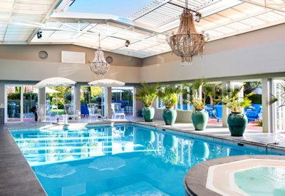 Outdoor pool as well as that beautiful indoor pool area
