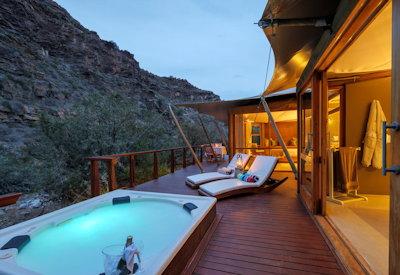 Private plunge pools and deck at tented lodge