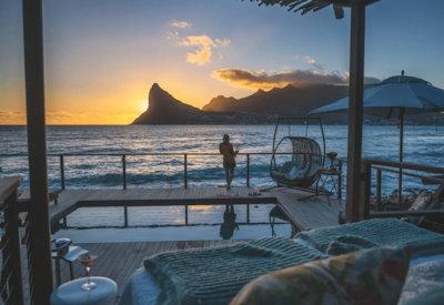 Your own private balcony overlooking a pebbled beach