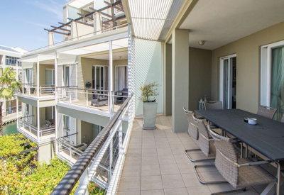 Balconies with dining options overlooking the village