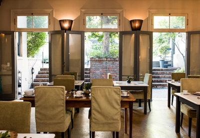 Breakfast room overlooking outdoor pool area
