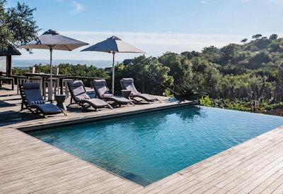 Swimming pools with sun loungers