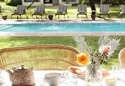 Breakfast outdoors next to pool