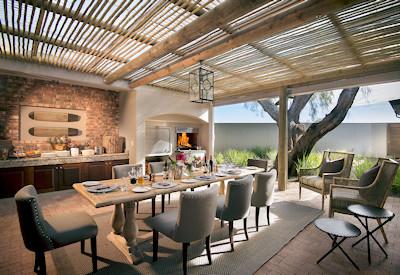 Outdoor dining area with braai area