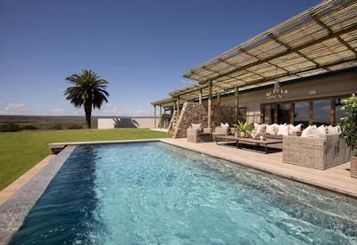 Lap pool infrom of house