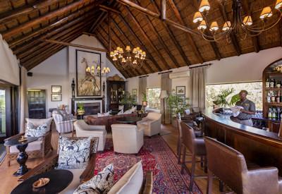 Main lounge and sociable cocktail bar with fireplace