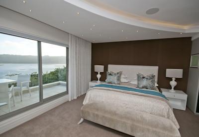 The house offers a spacious room with a private balcony