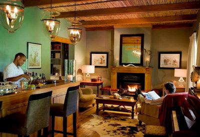 Bar area and fireplace at Samara