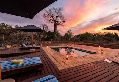 Intimate pool with sun loungers