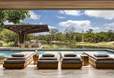 A swimming pool and private wildlife area