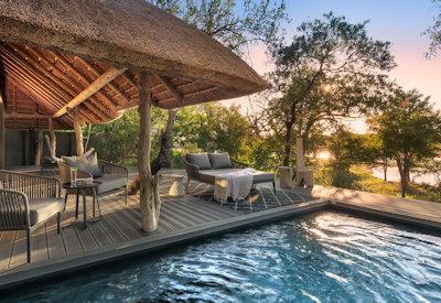 Game lodge offers guests a lake view deck