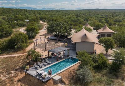 Main guest arera with outdoor dining areas and pool